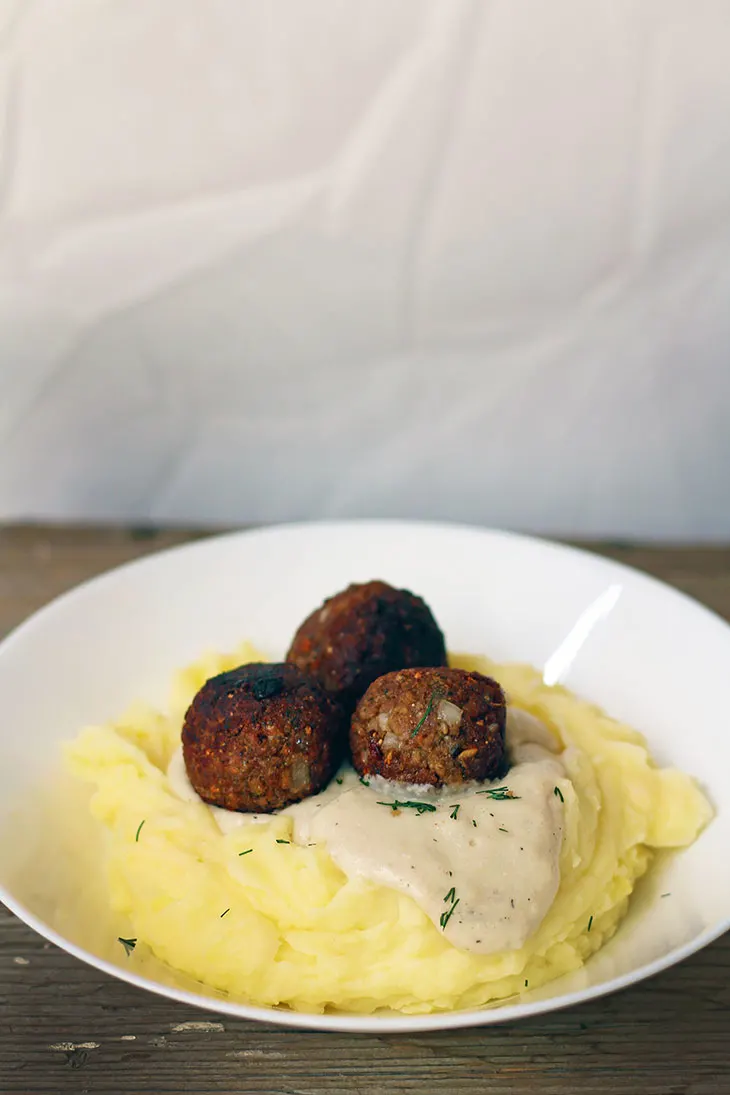 vegan meatballs in white sauce mashed potatoes 