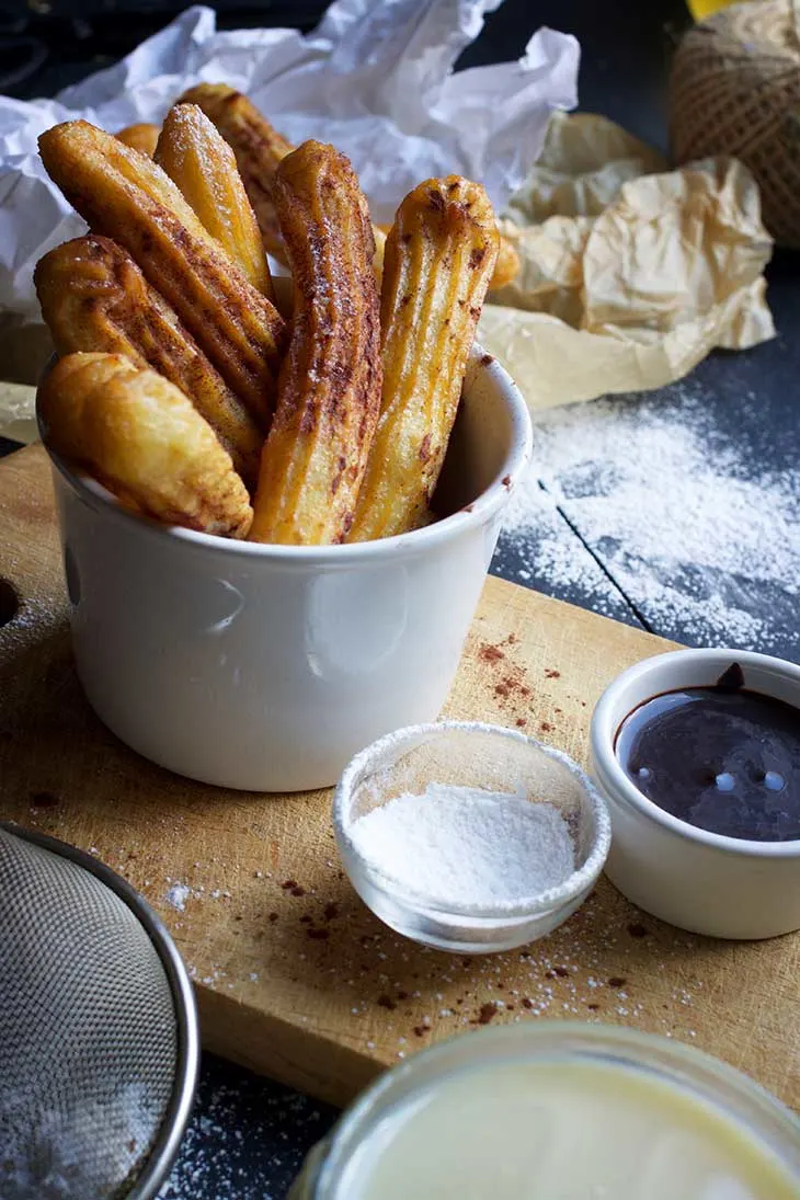 Vegan Churros with Chocolate Sauce and Dulce de Leche