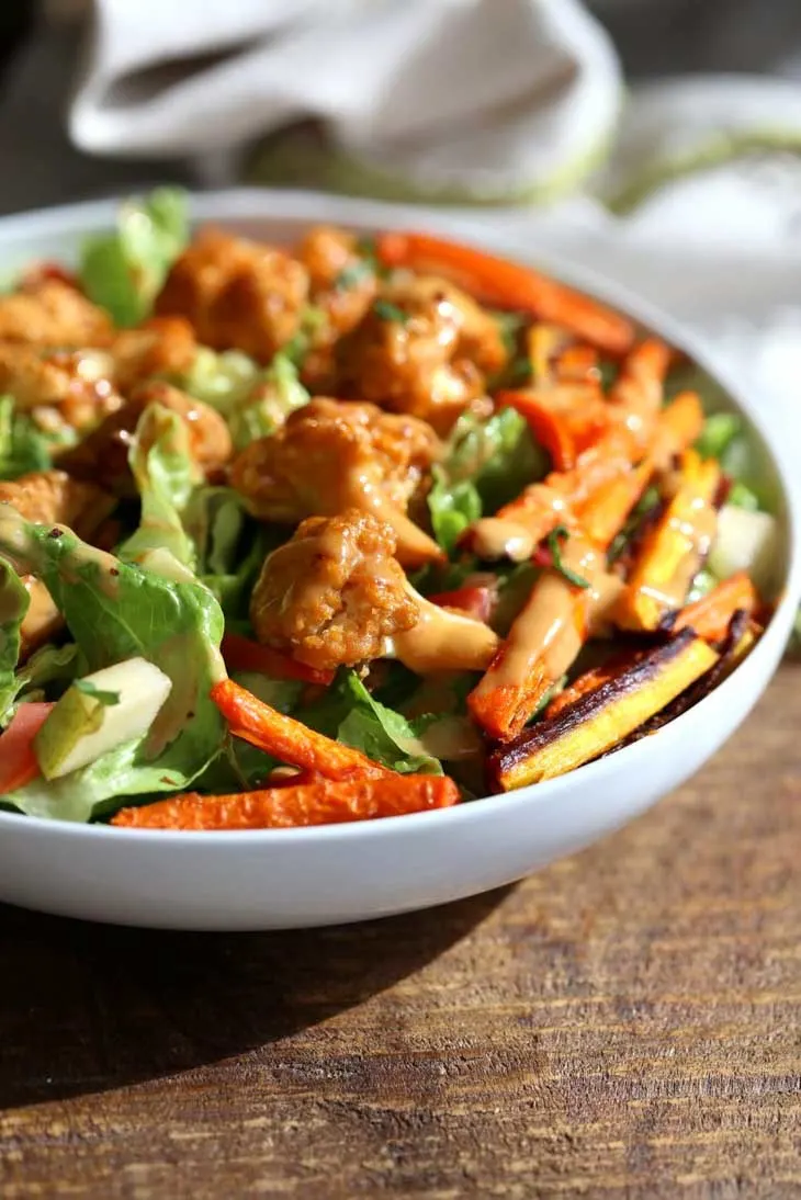 Peanut Butter Cauliflower Bowl with Roasted Carrots