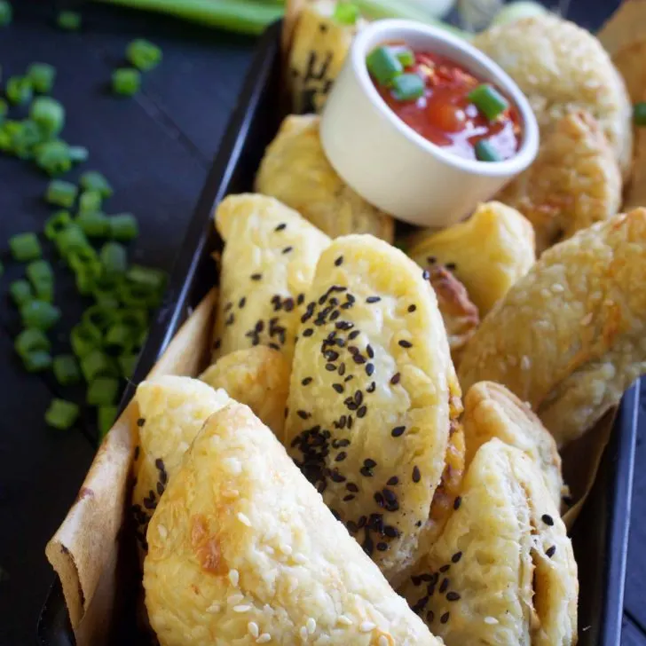 vegan empanadas with salsa sauce_