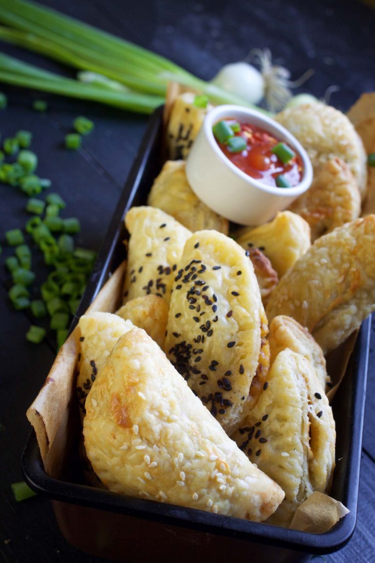 vegan empanadas with salsa sauce_