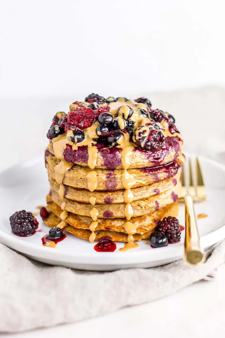 Vegan Peanut Butter And Jelly Banana Oat Pancakes