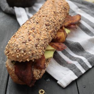 vegan eggplant bacon in sandwich