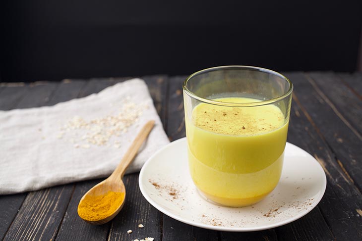 golden turmeric milk made of oats 