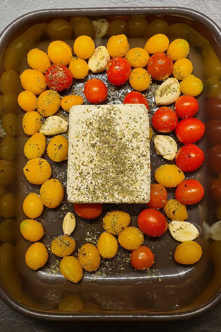 Roasted feta cheese with tomatoes branza feta la cuptor