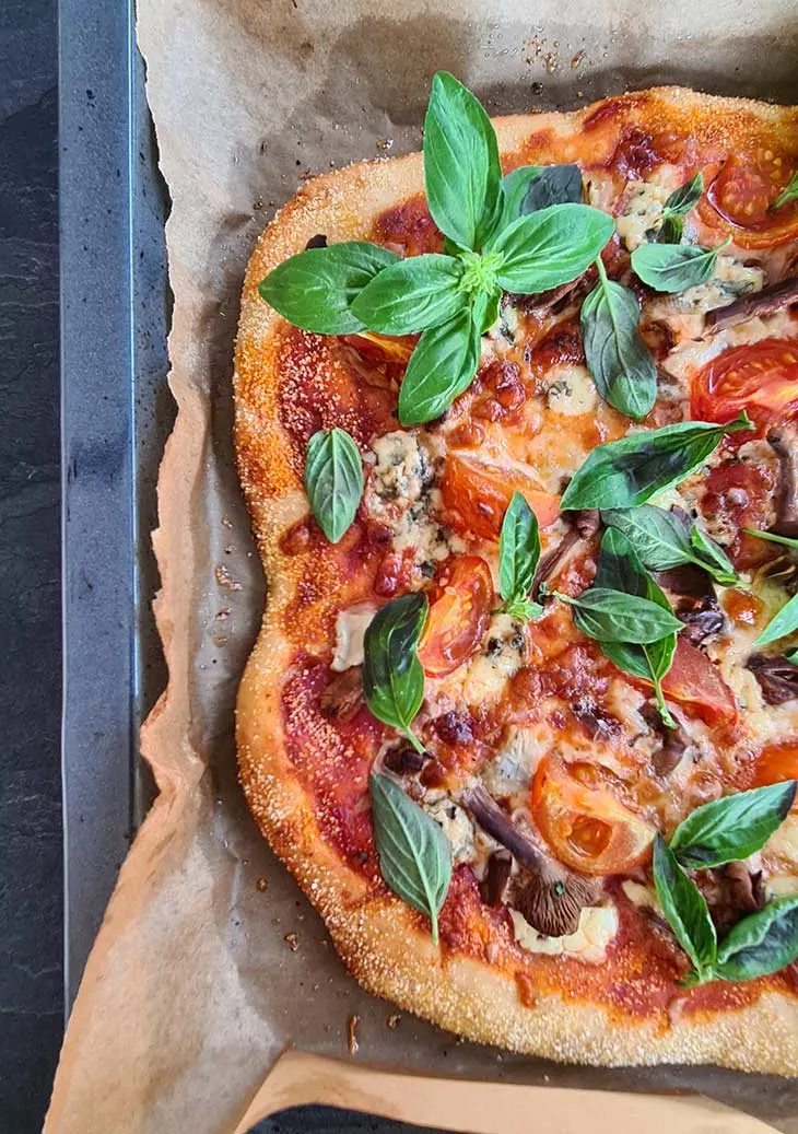 Homemade Pizza with Artichoke and Mushrooms