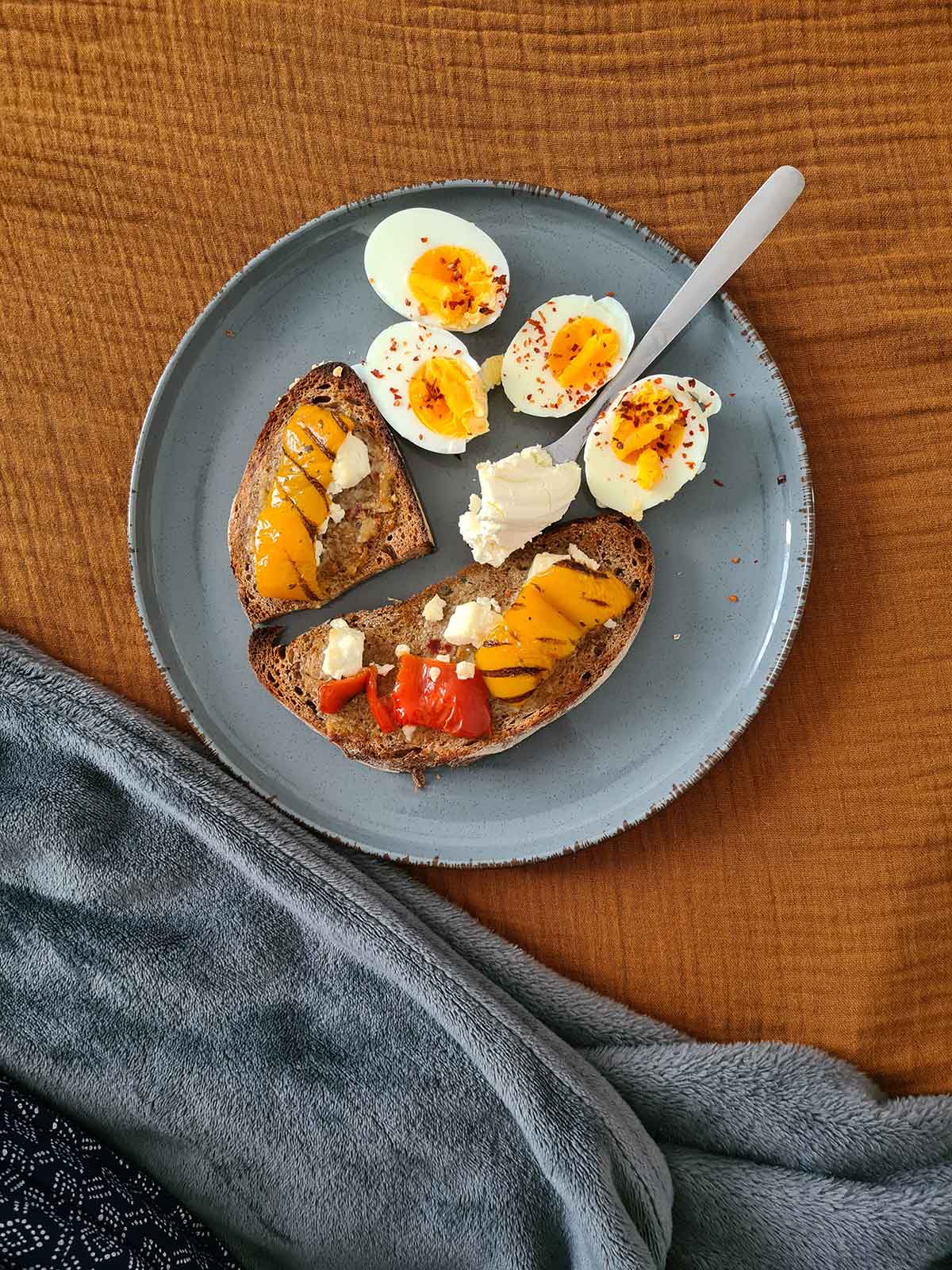 Grilled pepper toast with cheese and hard boiled eggs