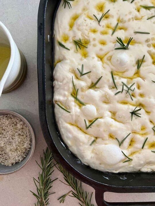 https://gourmandelle.com/wp-content/uploads/2022/09/Simple-Sourdough-Focaccia-Bread-bubbly-delicious-540x720.jpg