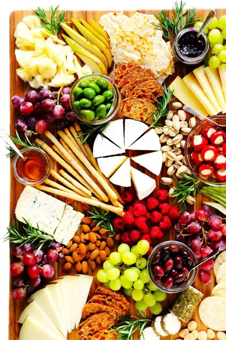 https://gourmandelle.com/wp-content/uploads/2022/11/Holiday-Cheese-Board-735x1103.jpg.webp