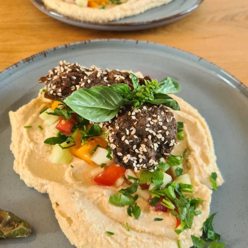 Crispy homemade falafel served with creamy hummus