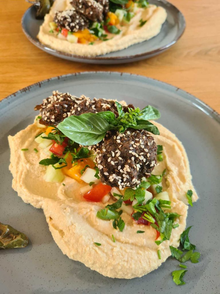 Crispy homemade falafel served with creamy hummus