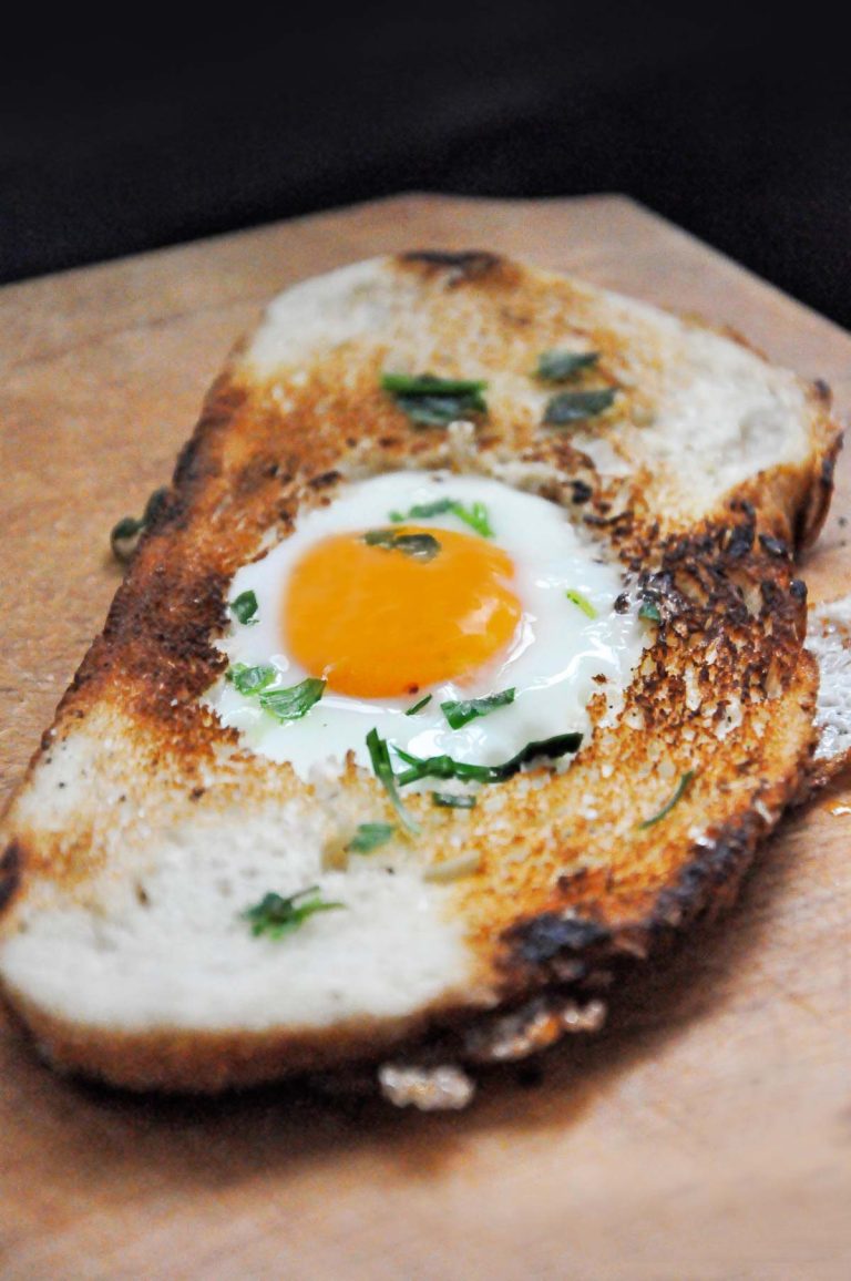 Egg in a hole, a fried egg cooked in a slice of toast