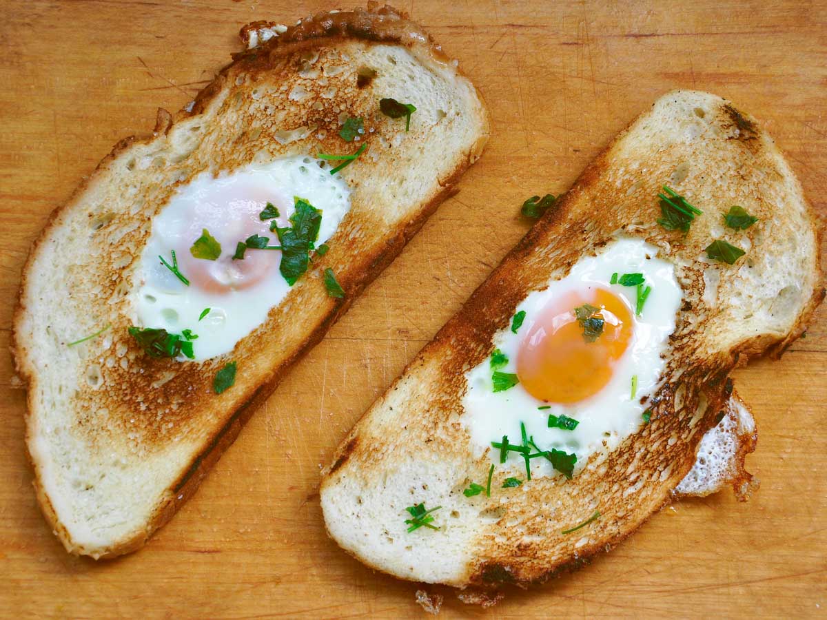 Egg-in-a-hole breakfast toast with runny yolk