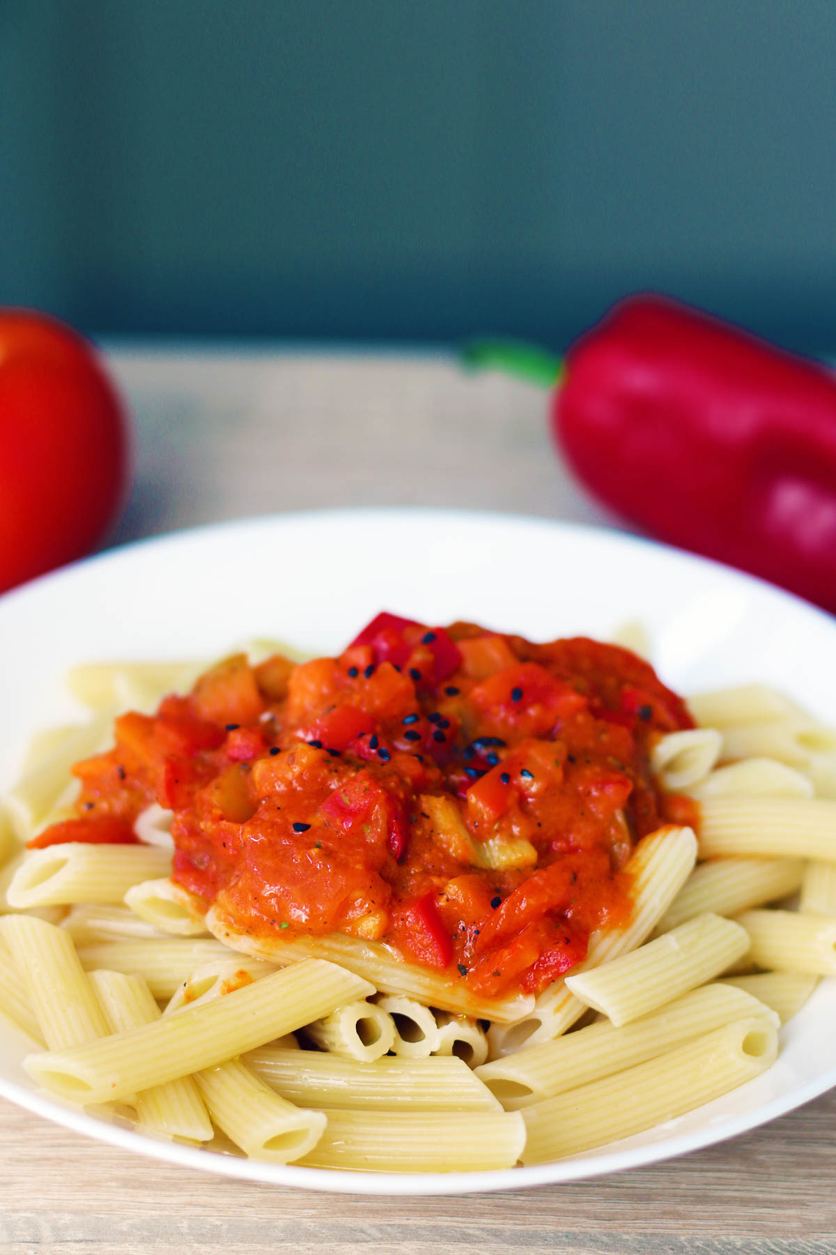Chunky red pepper tomato sauce on pasta