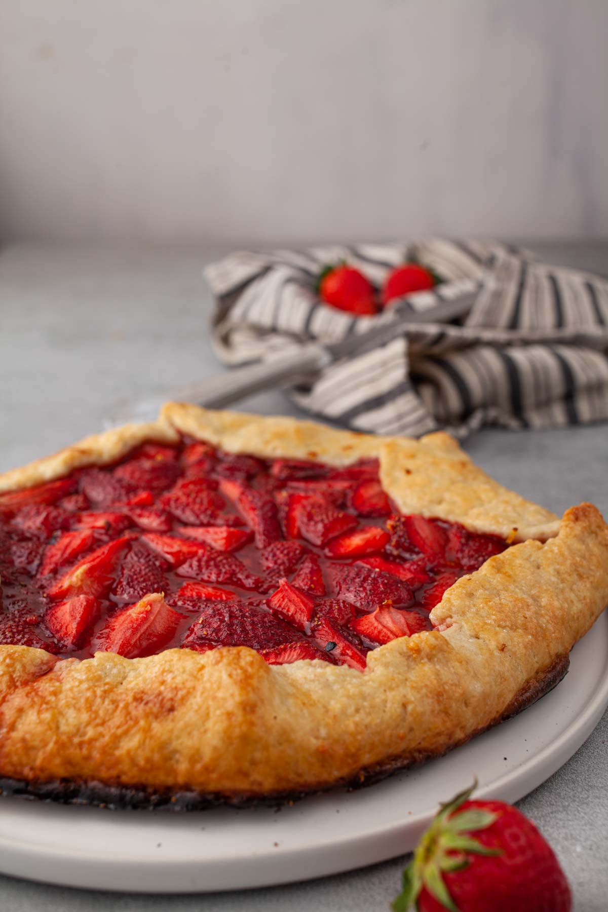 Golden baked strawberry galette with folded crust