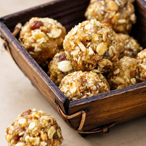 No-bake protein balls with oats and raisins on a plate