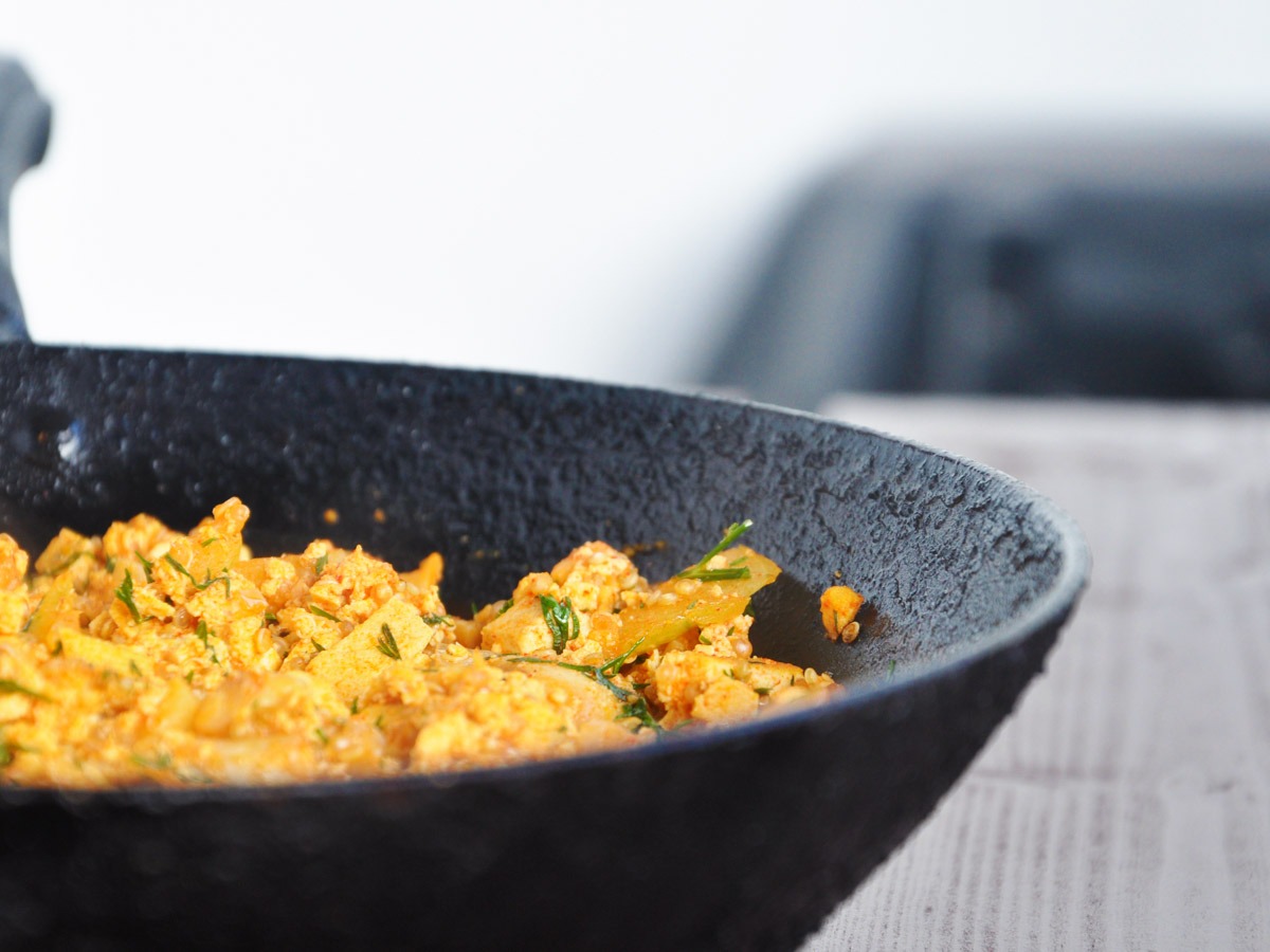 Vegan tofu scramble breakfast skillet served on toast